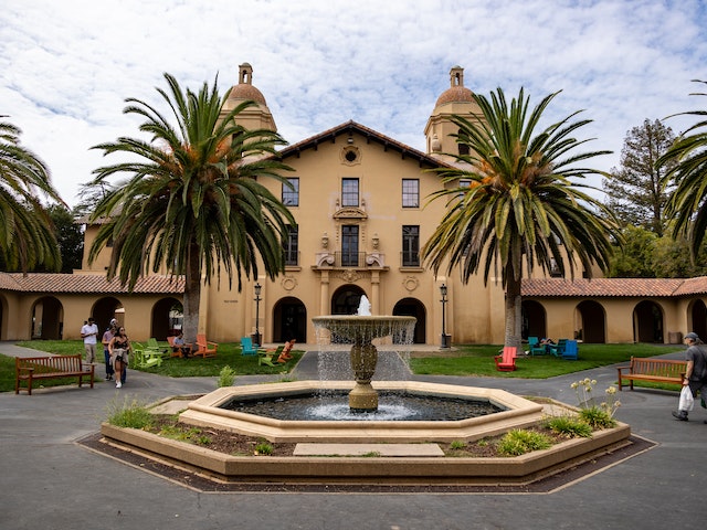 Iconic Stanford University campus with the Hoover Tower and picturesque palm-lined pathways
